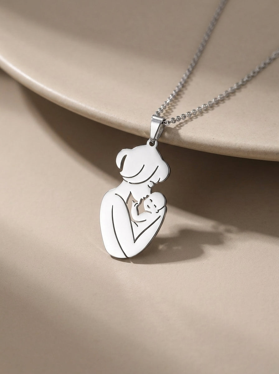 Always With You Mother and Baby necklace on a neutral surface
