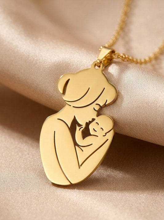Gold Mother and Baby necklace pendant detail
