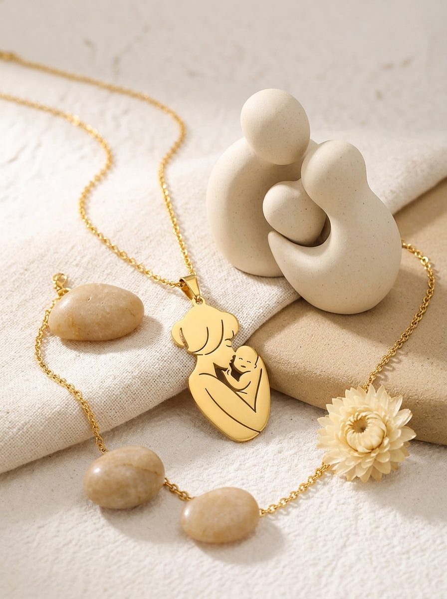 Gold Mother and Baby necklace with neutral styling props