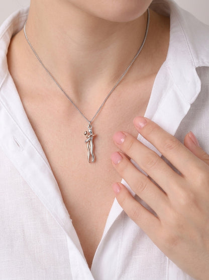 Model wearing the Always Close silver hug necklace