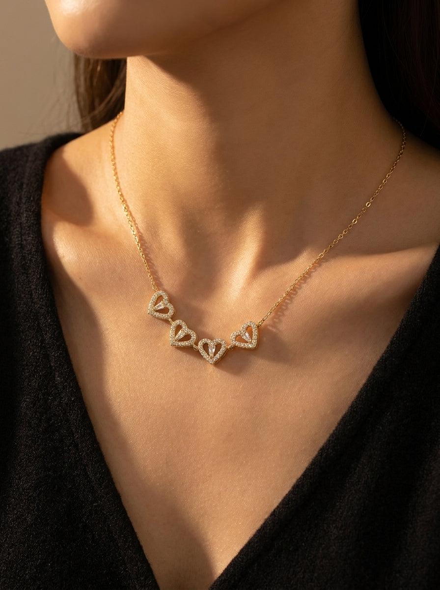 Model wearing the two-way Love in Bloom heart clover necklace