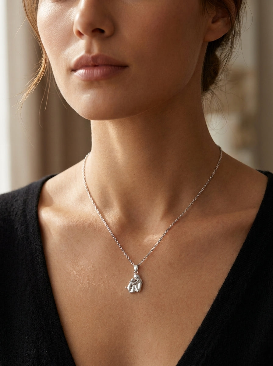 Model wearing the silver Forever Hug Dog Lover Necklace